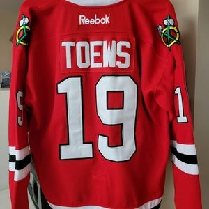 Men or women can wear. Excellent condition. Official Toews jersey!